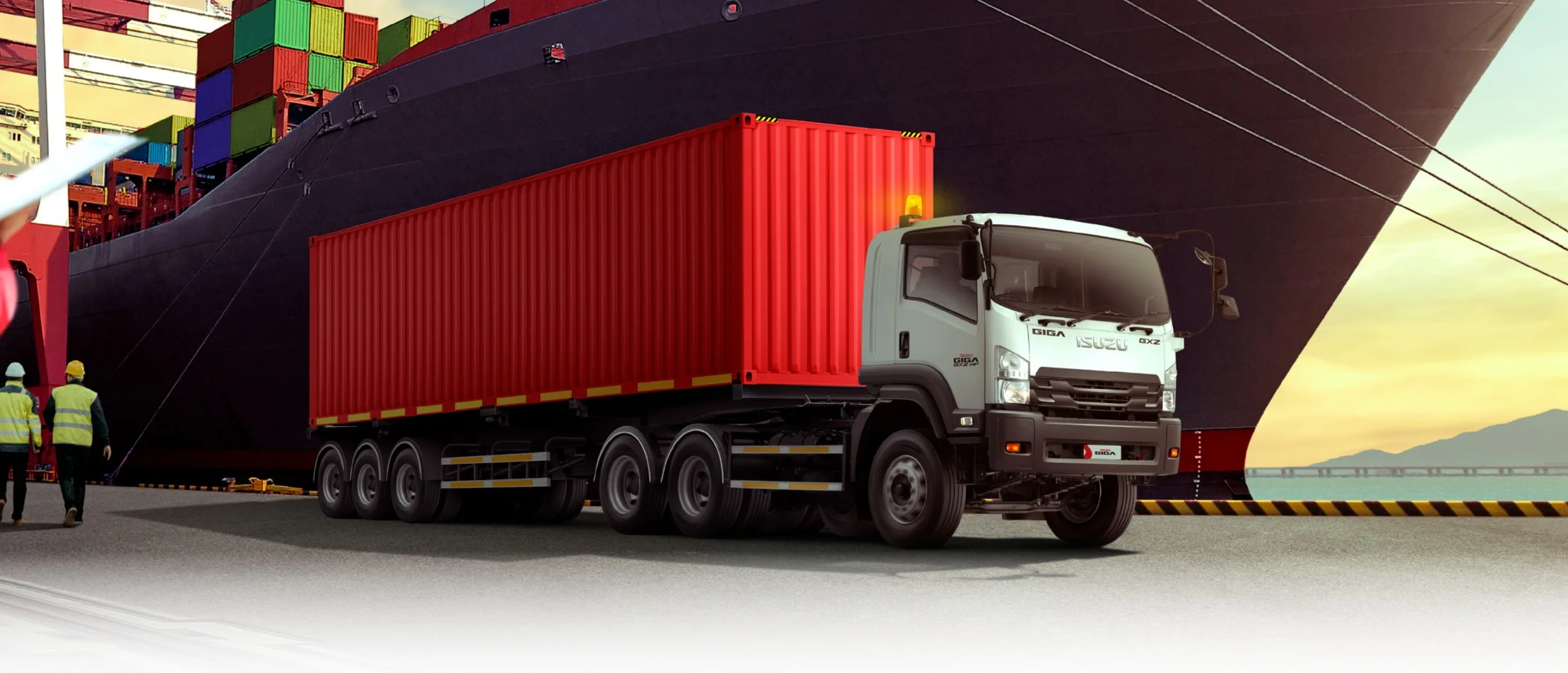 Truk Isuzu Giga Tractor Head membawa trailer bermuatan berat